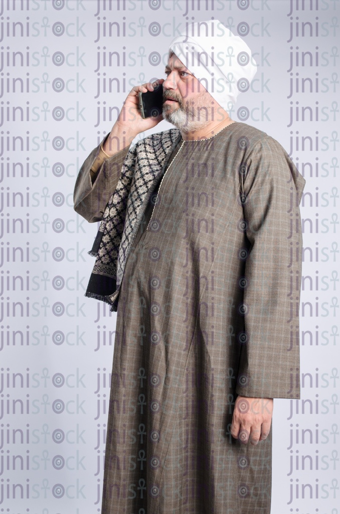 Egyptian man from upper egypt talking on his phone