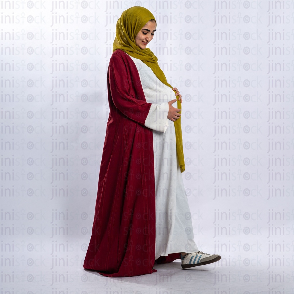 Arabian woman wearing hijab pregnant