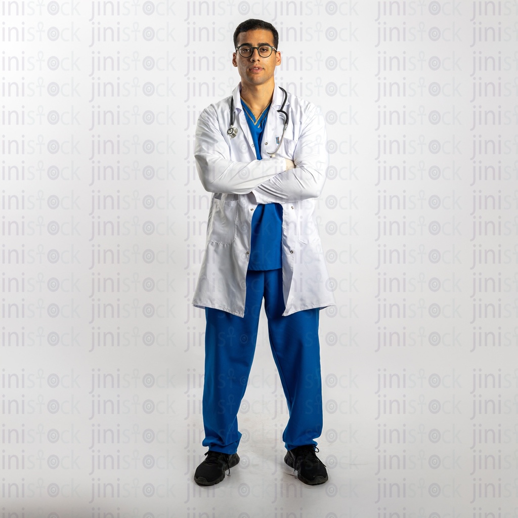 Egyptian doctor standing with confidence folding his arms