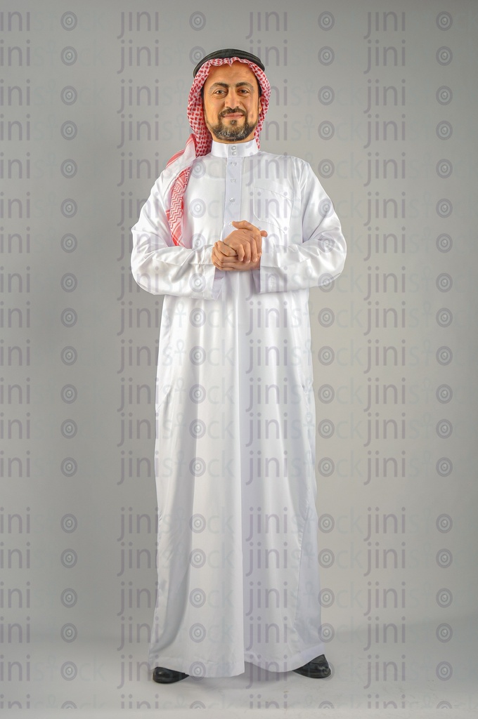 A man from the Gulf Saudi Arabian or Emirati smiling.