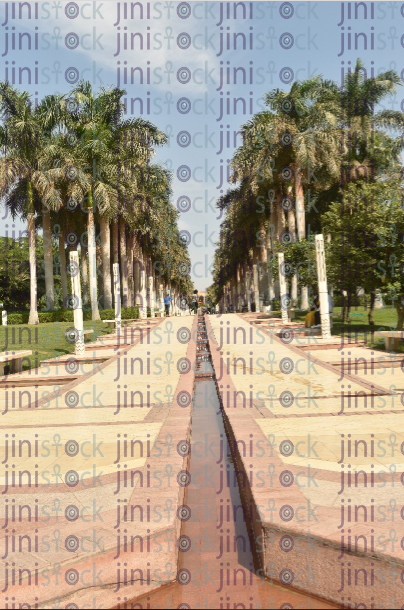 A walkway with trees - stock image