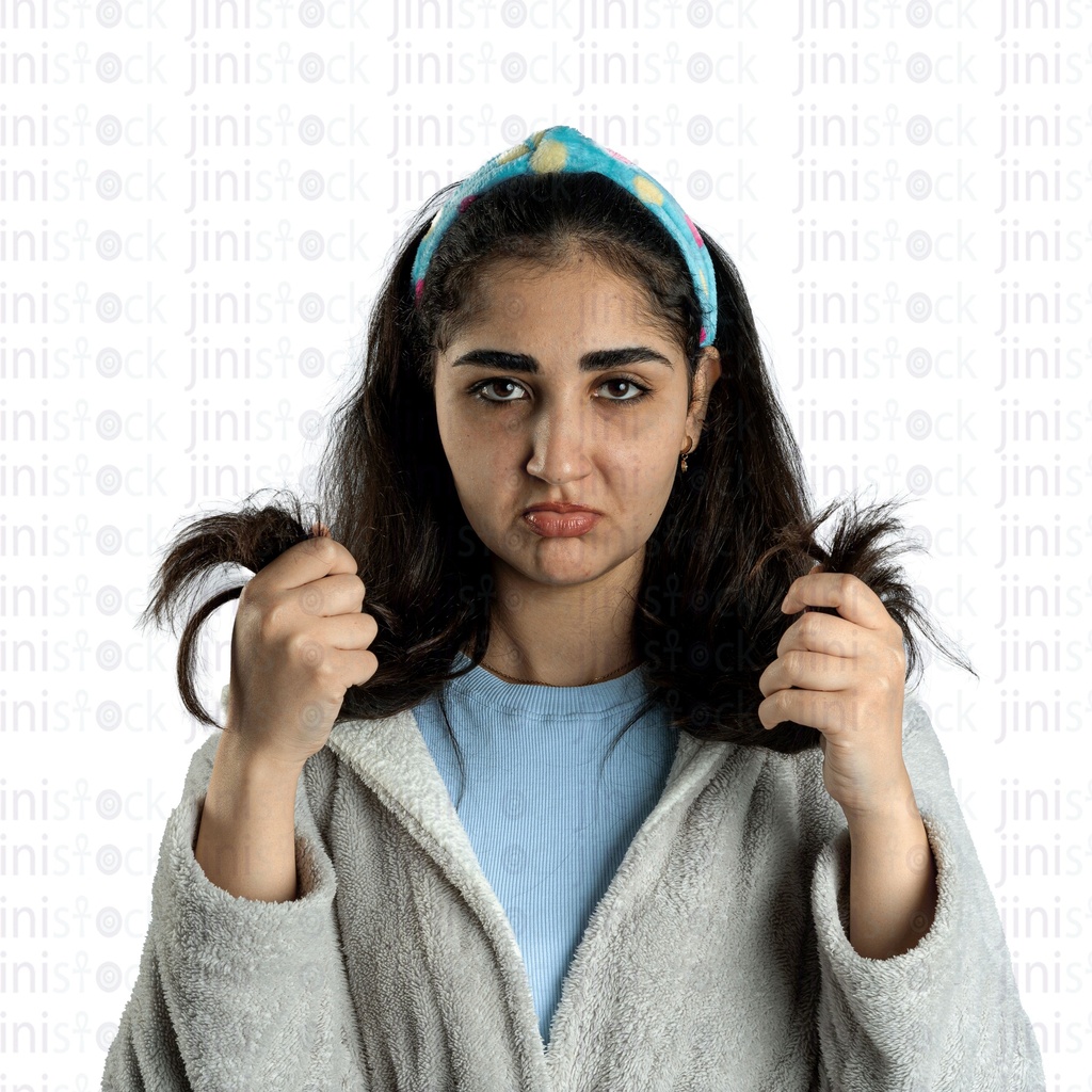 Young Egyptian woman up set about her hair