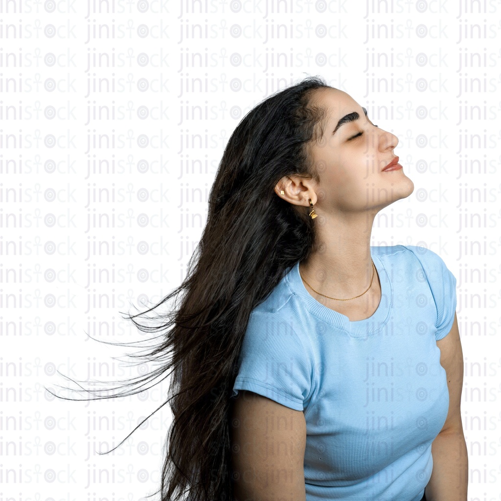 Young Egyptian man with long beautiful black hair flying