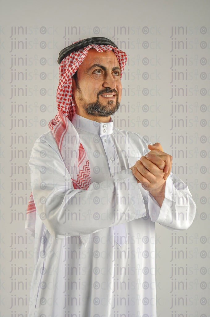 A man from the Gulf Saudi Arabian or Emirati who feels proud of belonging to the Gulf