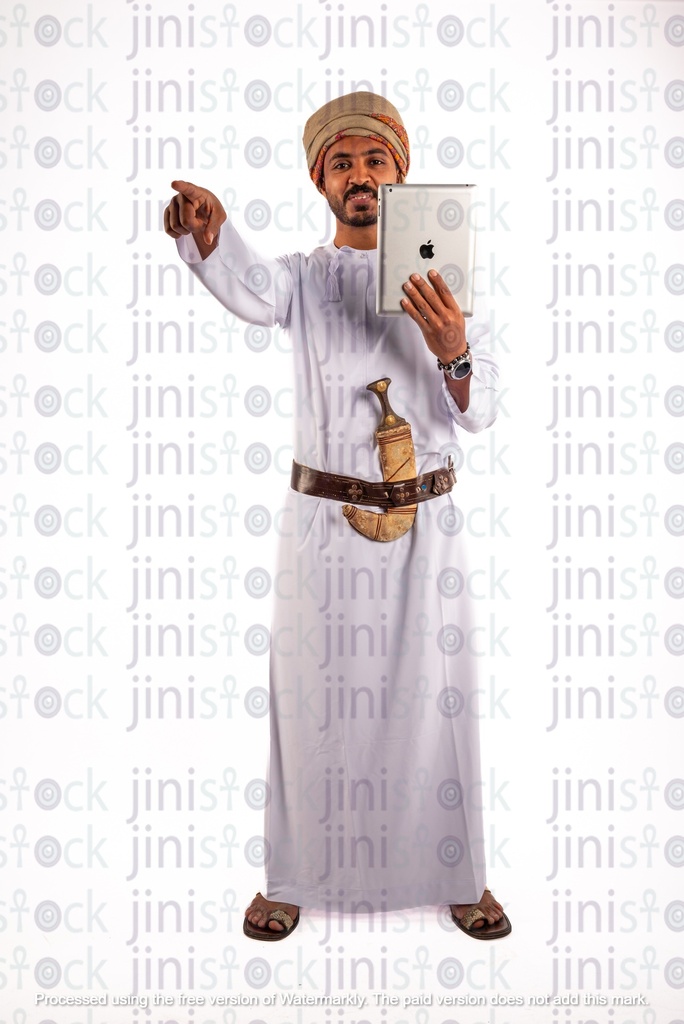 Omani khaliji arab man from gulf holding tablet and pointing at something