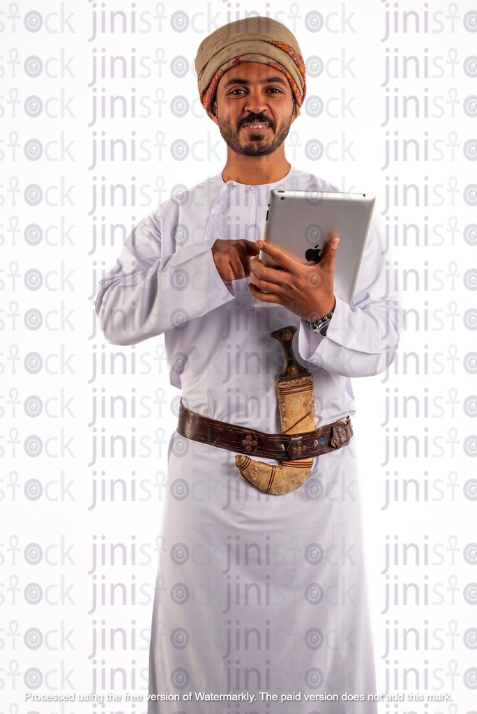 Omani arab khaliji man from gulf holding ipad