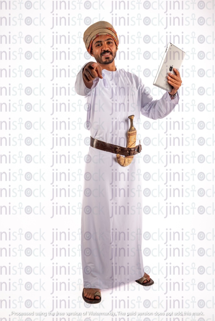 Omani arab khaliji from gulf holding iPAD happy and pointing at camera