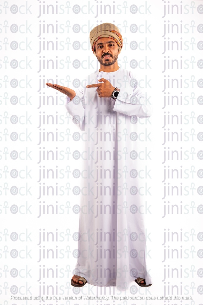 Omani khaliji Arabian man from gulf pointing at something in his hands