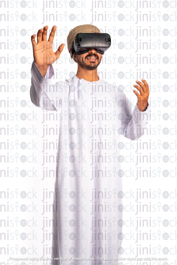 Omani man khaliji arab from gulf wearing VR glasses