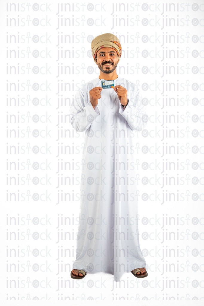 Omani khaliji man from gulf holding visa card