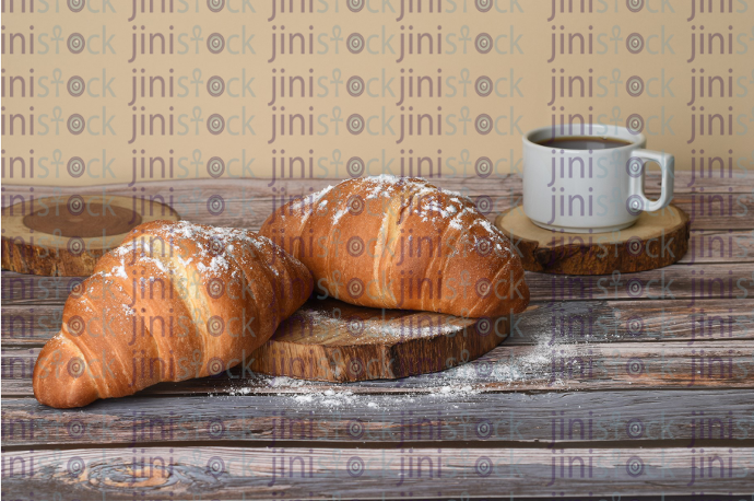 croissant on a cutting board - stock image