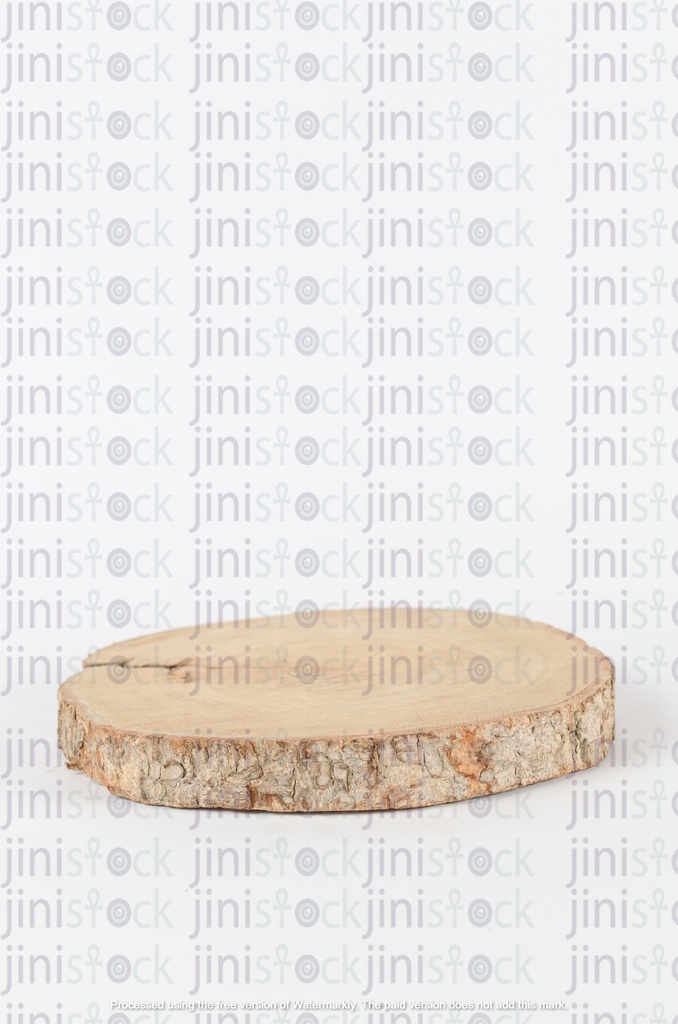 A circular tree trunk resting on a table - desk 