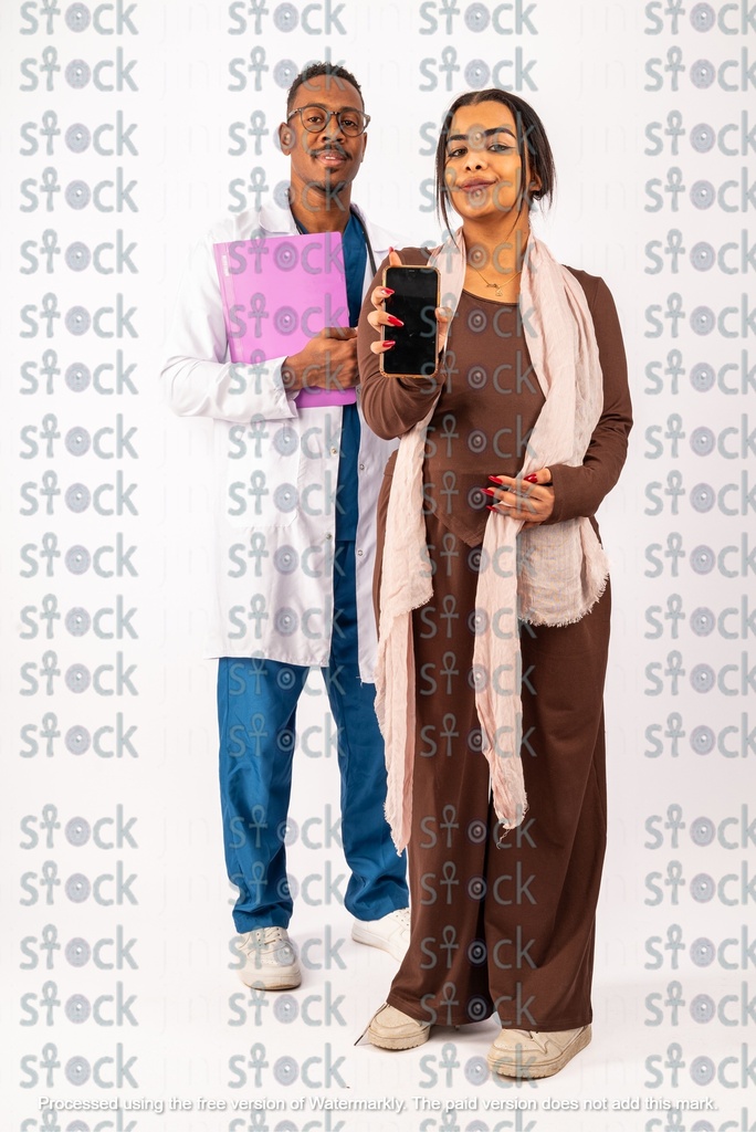 Nubian girl holding her phone next to the doctor