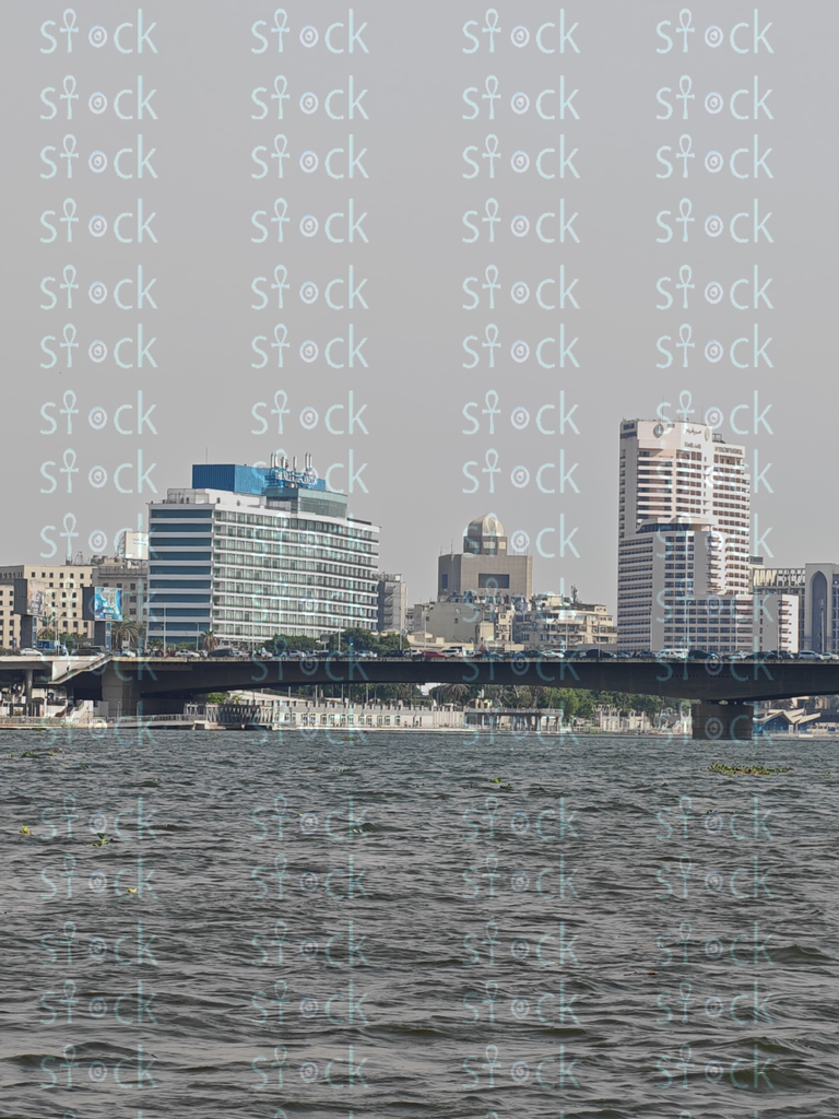 The Nile embraces the Qasr El Nil Bridge in a calm atmosphere