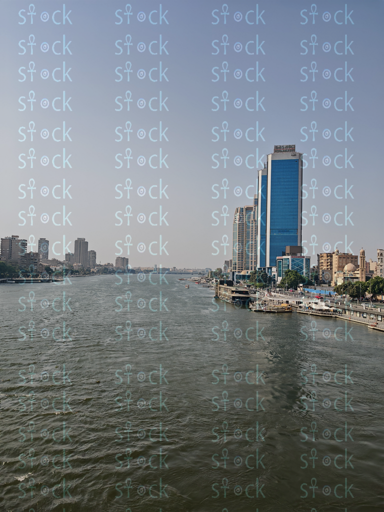 The Nile is reflected in the magnificent National Bank building