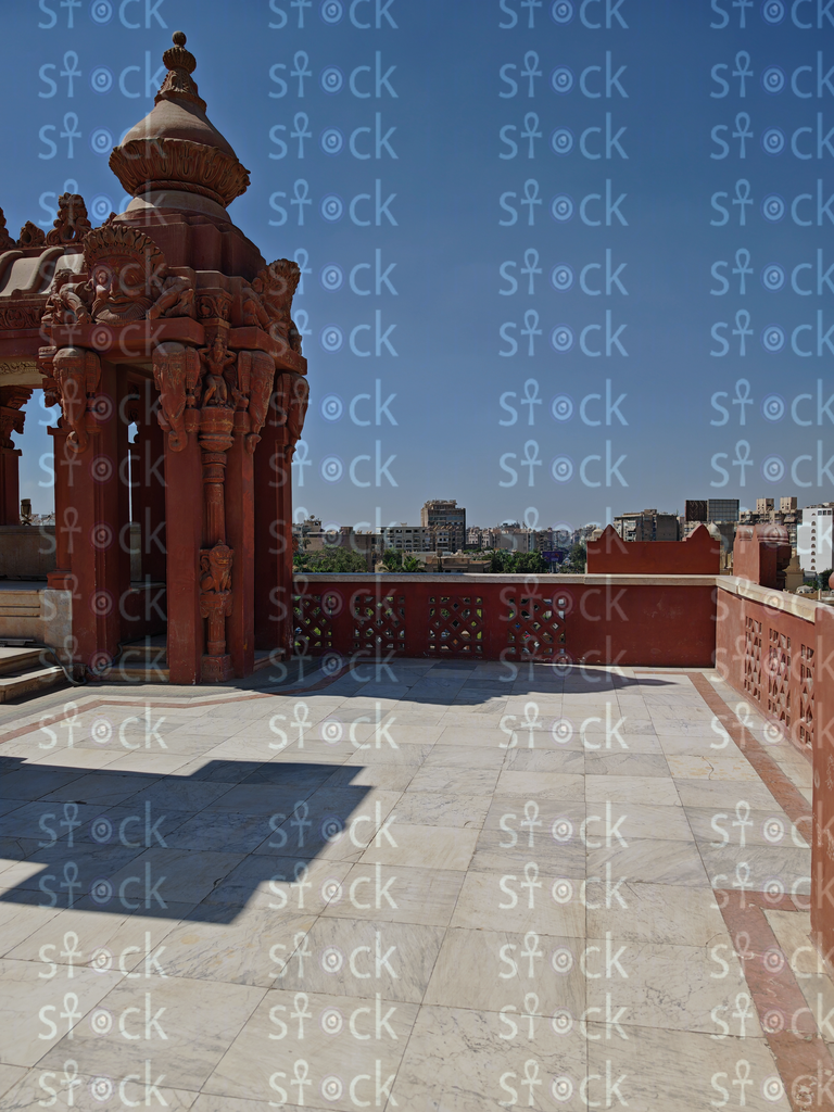 Palace rooftop with carved railing 