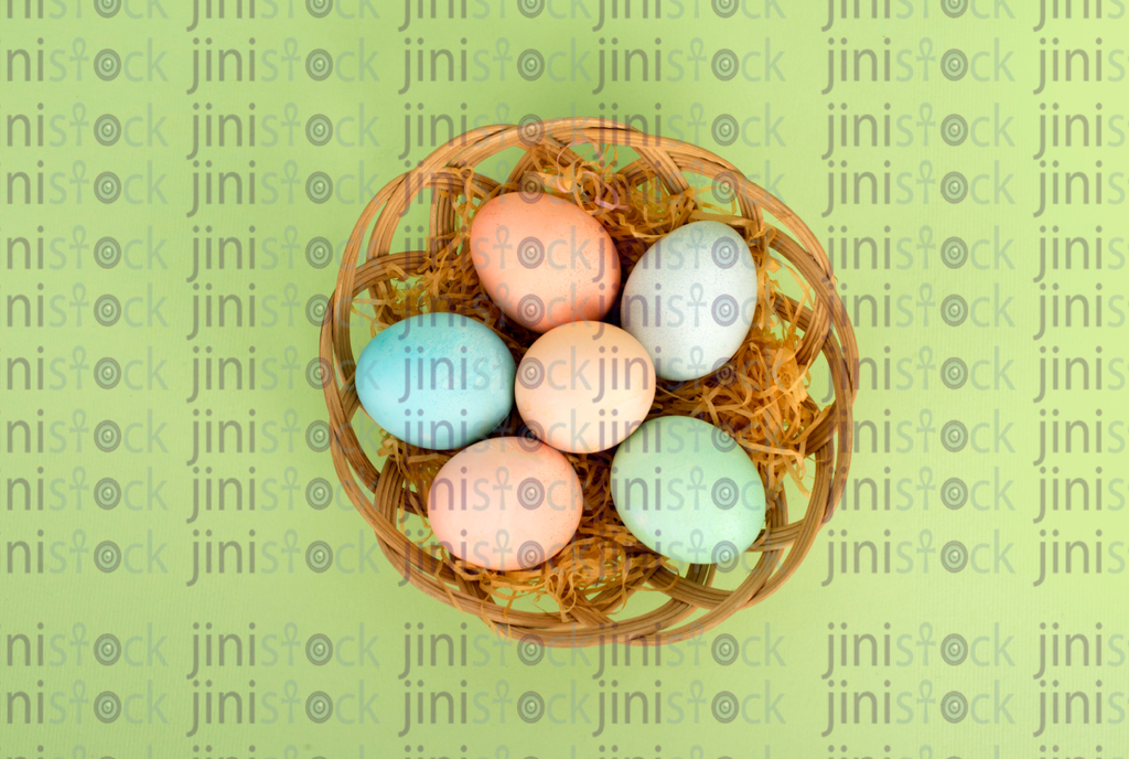 Easter eggs in a basket-stock image