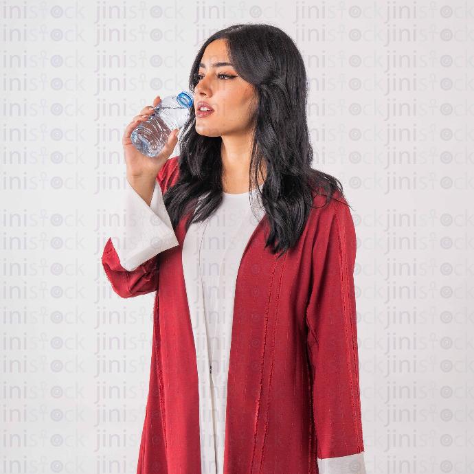 khaliji woman drinking water stock image