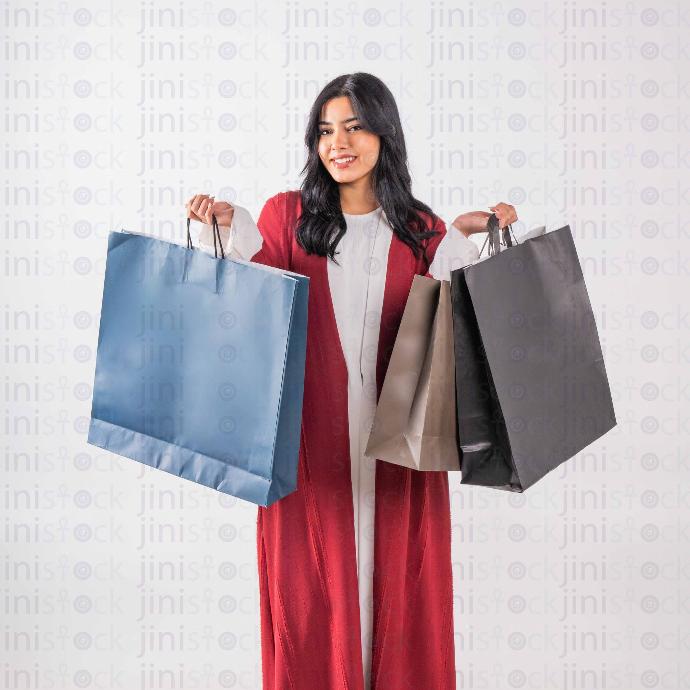 khaliji woman shopping with red dress