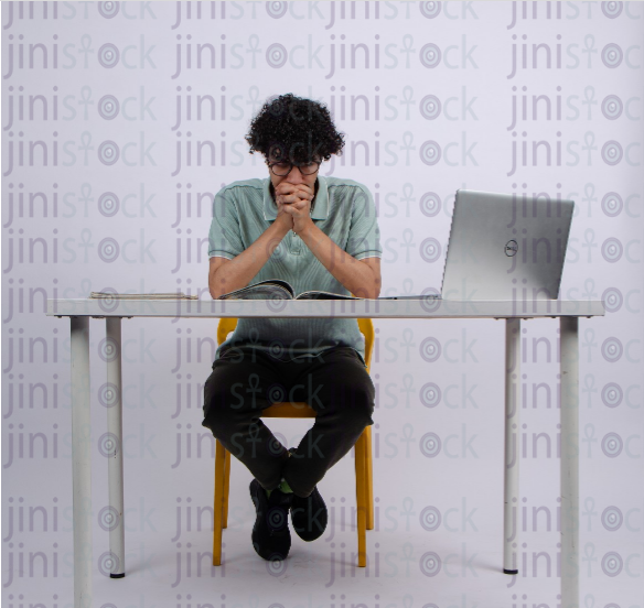 young man focused while studing - stock image