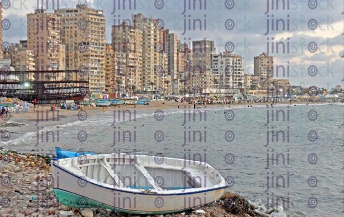 a stock image with hiqh quality of small boat on alexandria sea مركب صغير على شاطئ اسكندرية