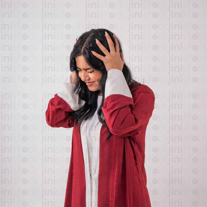 khaliji woman with headache stock image