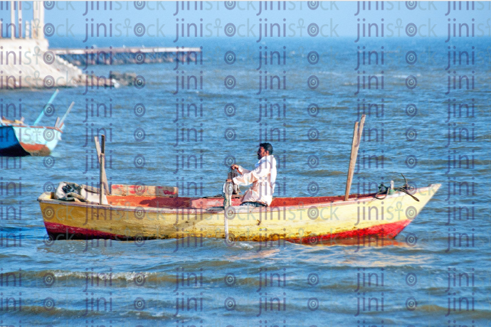 sailing a boat in Qaroun lake in Fayoum مركب فى بحيرة قارون - stock image