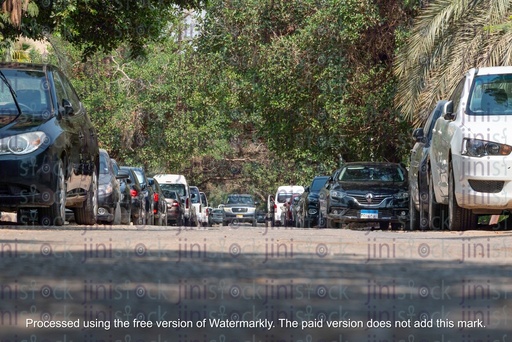 road with car parked on the side- stock image