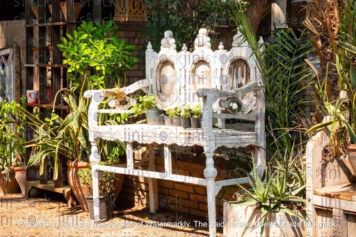 white couch in the garden - stock image