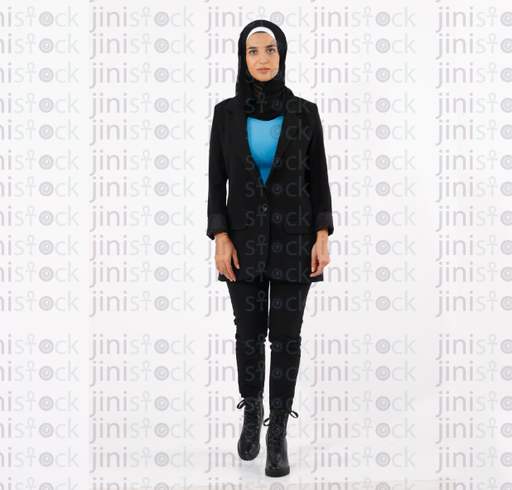 A female model wearing a hijab and a black suit