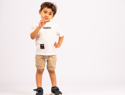 3 years old boy making a peace sign - stock image