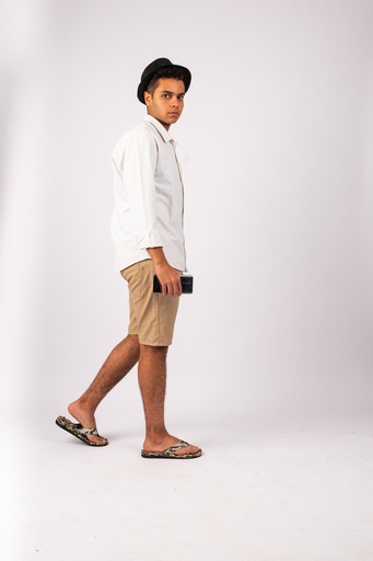 Egyptian man walking in a summer wear - stock image