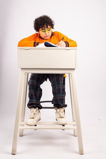 teen boy studying - stock image