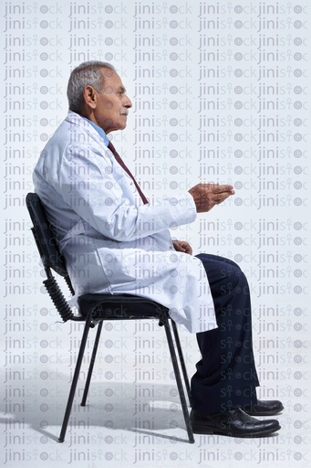 old doctor talking side view sitting