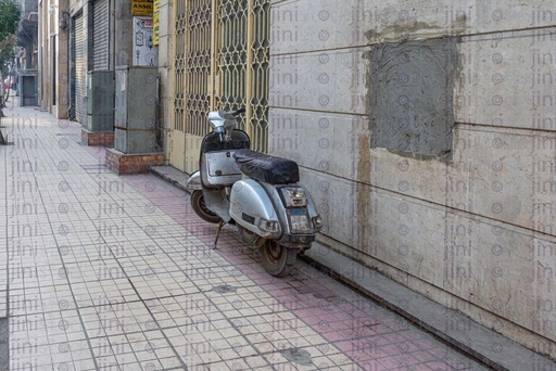 motorcycle parked on the pavement