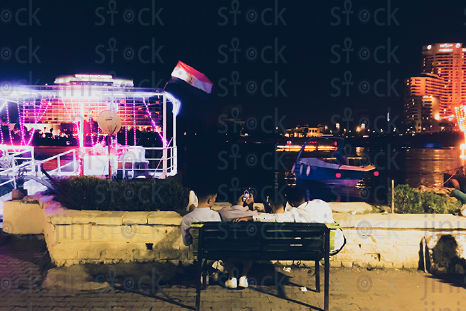 friends sitting in front of Chornich El Nile