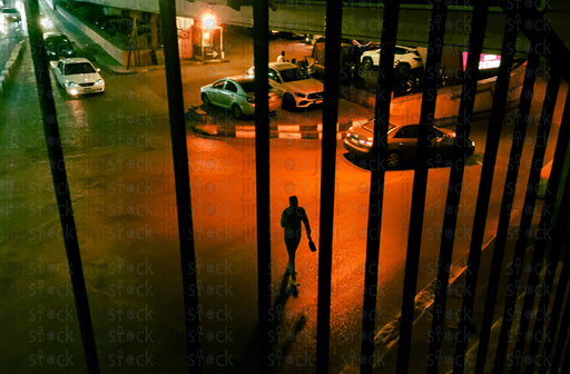 seeing the street through bars simulating captivity