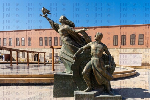 Statue at citadel for a woman holding a torch