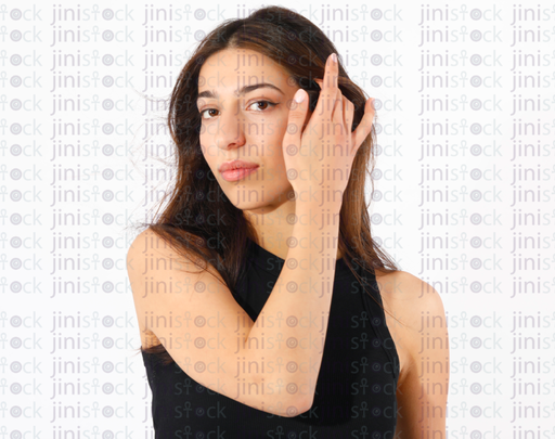 Isolated female model playing with her hair high quality stock image