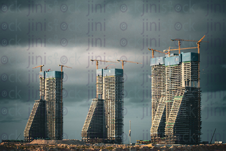 Towers of El Alamin City in Egypt during sunrise.