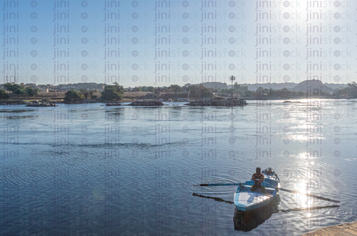 fisher man in aboat in the nile