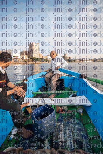 a small boat fishing with fishermen on it stock image with high quality