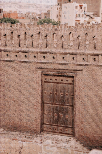 old door in islamic wall - stock image