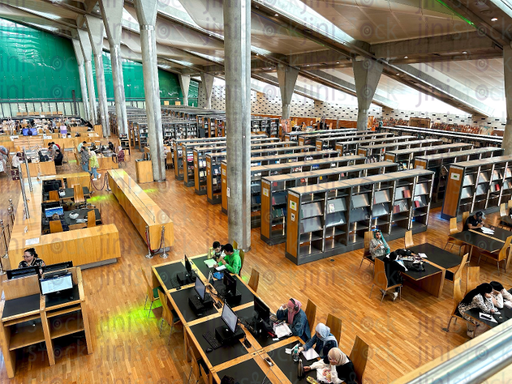 desks inside alexandria library - stock image