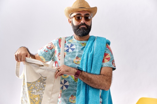 man with empty beach bag.