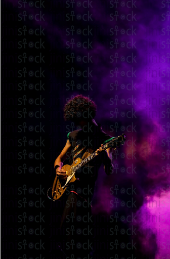 Musician playing guitar stock image