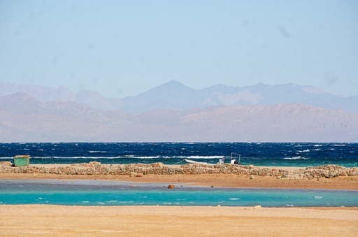 background for the lagoons and the dark sea water and the mountains.