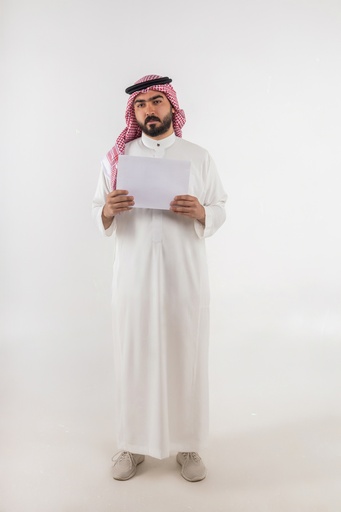 khaliji man holding a white sign