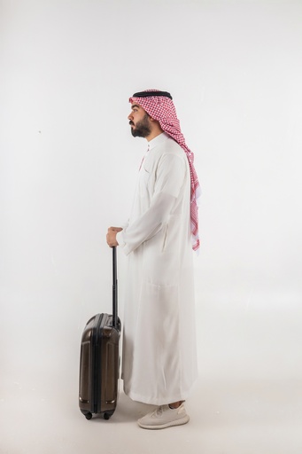 stock image of a khaliji man with travel case