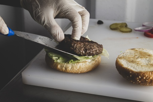 Chef making burger